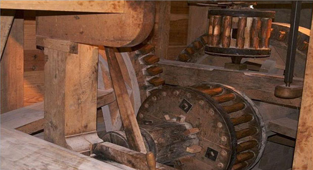 a Photo of the restoration work done on George Washington’s grist mill at Mount Vernon. 
